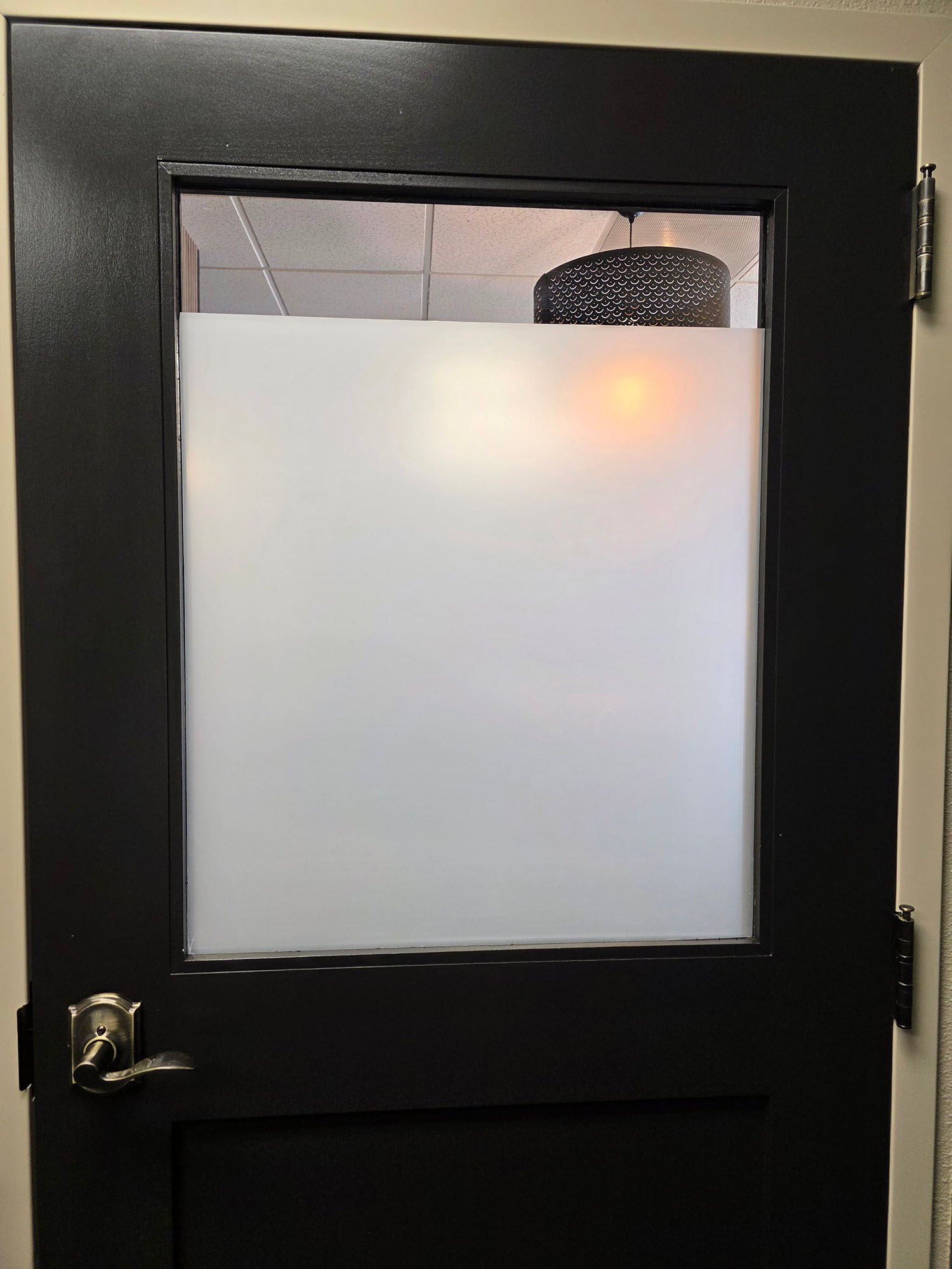 Commercial office glass door with custom frosted privacy window film