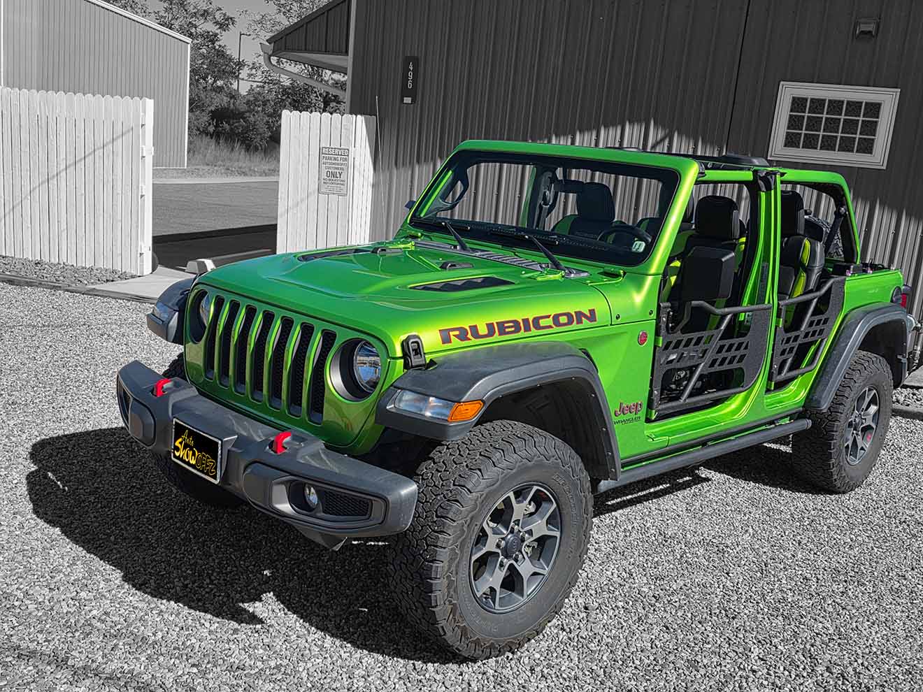 Green Jeep Wrangler Rubicon with Doors Off and Custom Interior