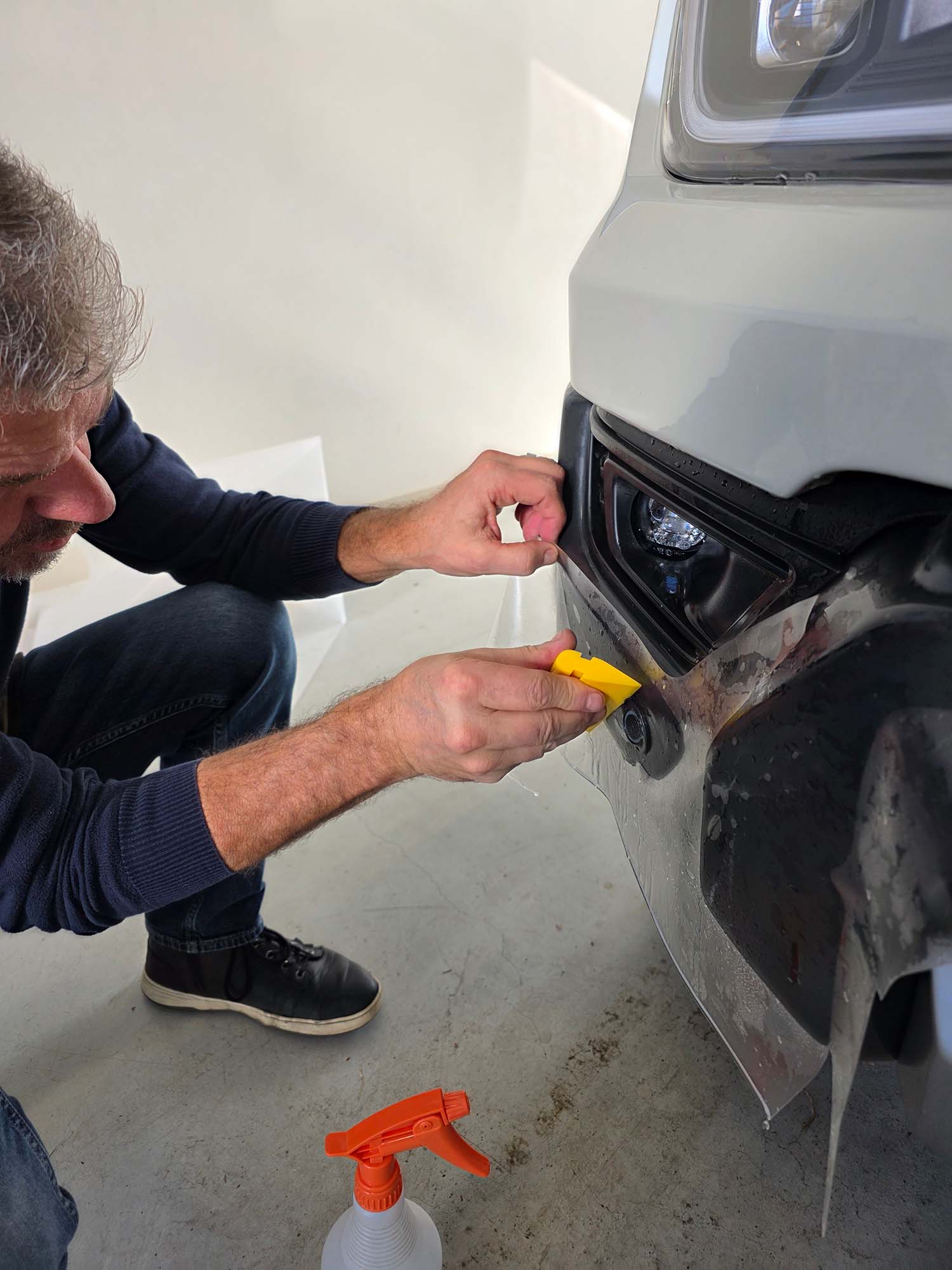 Precise XPEL PPF Trimming on Fog Lights - Grand Junction Restyling